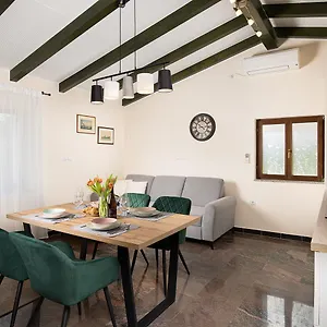 Modern Stone House With Flowers & Playground Medolino